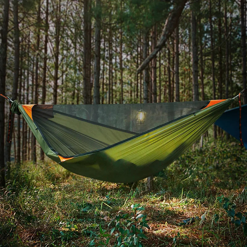 Travelers camping outdoors with mosquito net hammocks, increased anti roll over speed, anti mosquito hammocks