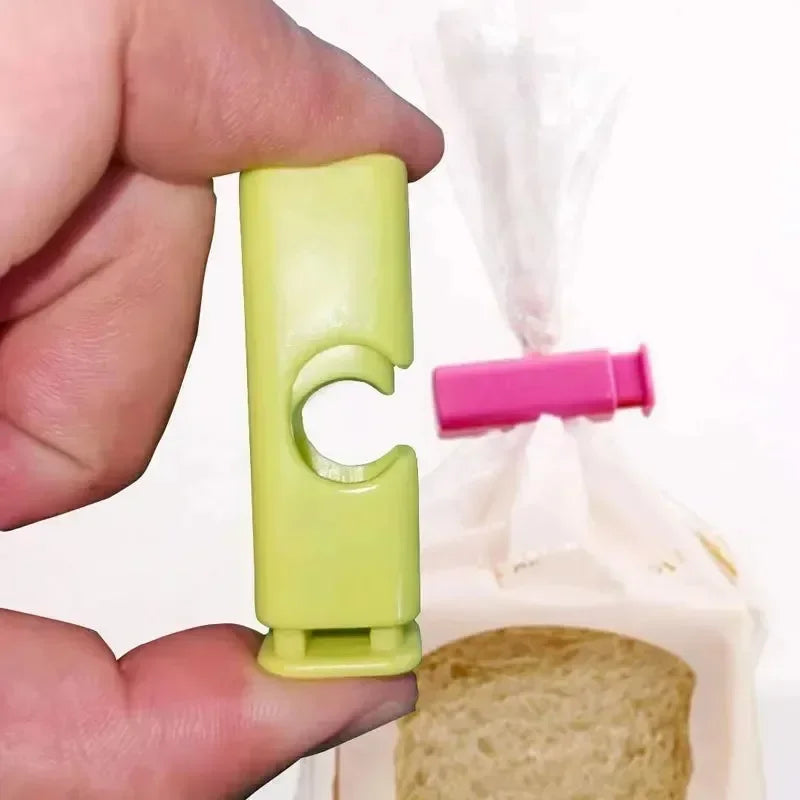 1-12 STK Squeeze Bread Bag Clips Genanvendelige Fresh Food Seal Plastic Clip Snack Bag Seal Spring Clip Hjem Køkken Opbevaring